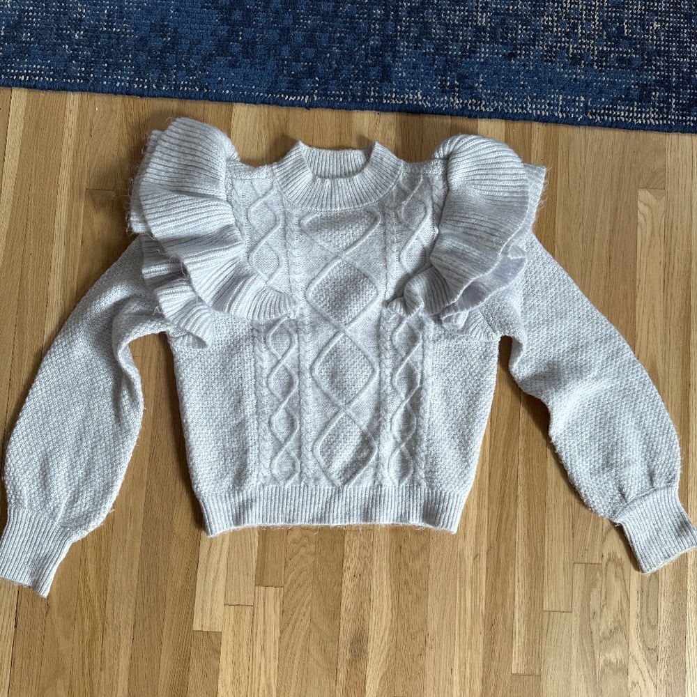 Ruffle cable knit sweater